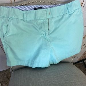 Pastel teal shorts, British khaki, never worn.